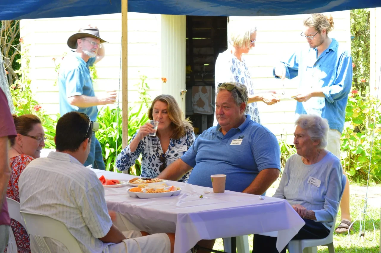 Campbell Family Reunion 2018 — guests at table under tent