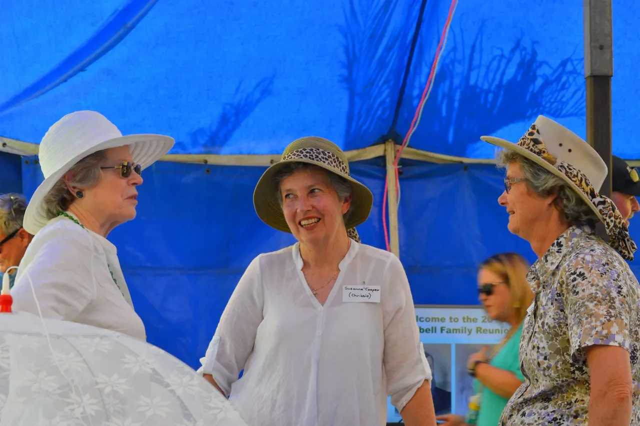 Campbell Family Reunion 2018 — three women conversing under tent